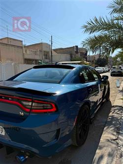 دۆج چارجەر